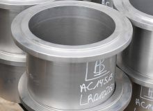 Les Bronzes d'Industrie - Produits moulés par centrifugation - Alliages d'aciers inoxydables -  Douille à collerette ébauchée en acier Duplex 1.4470 GX2CrNiMoN22-5-3